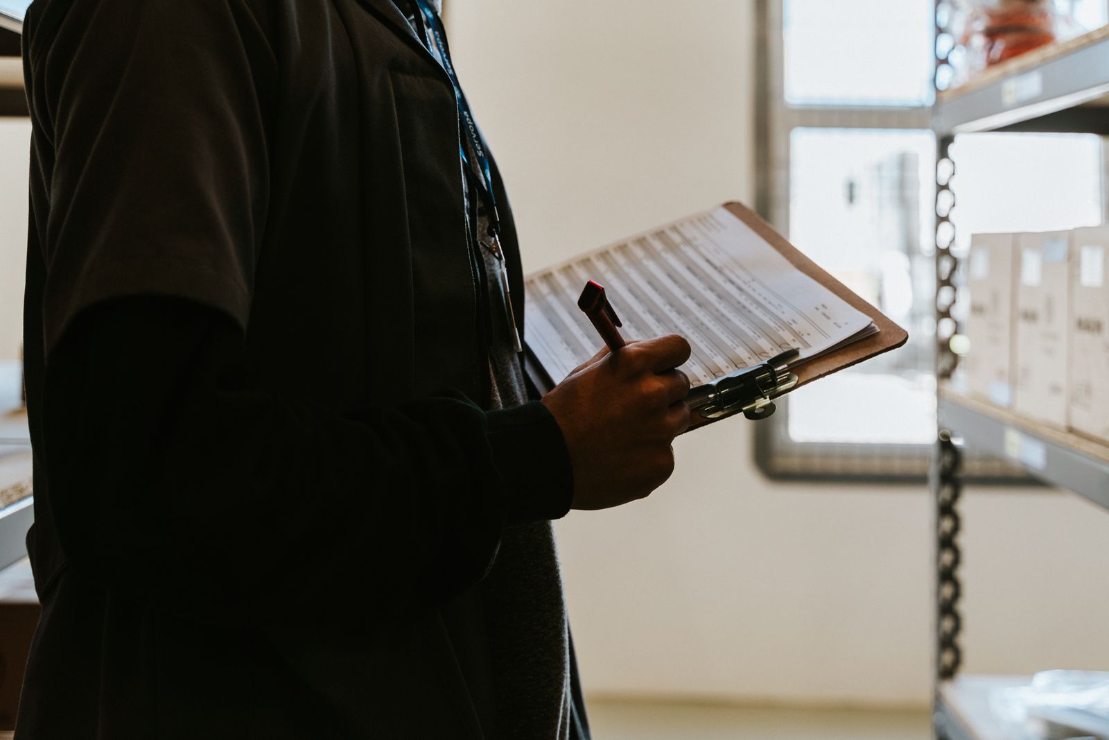 Checking warehouse stock against a clipboard list